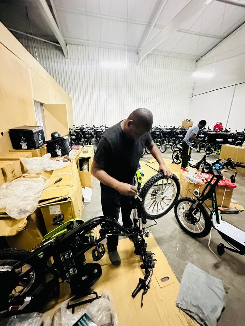 Gabs Eats electric bikes being assembled at the fleet workshop